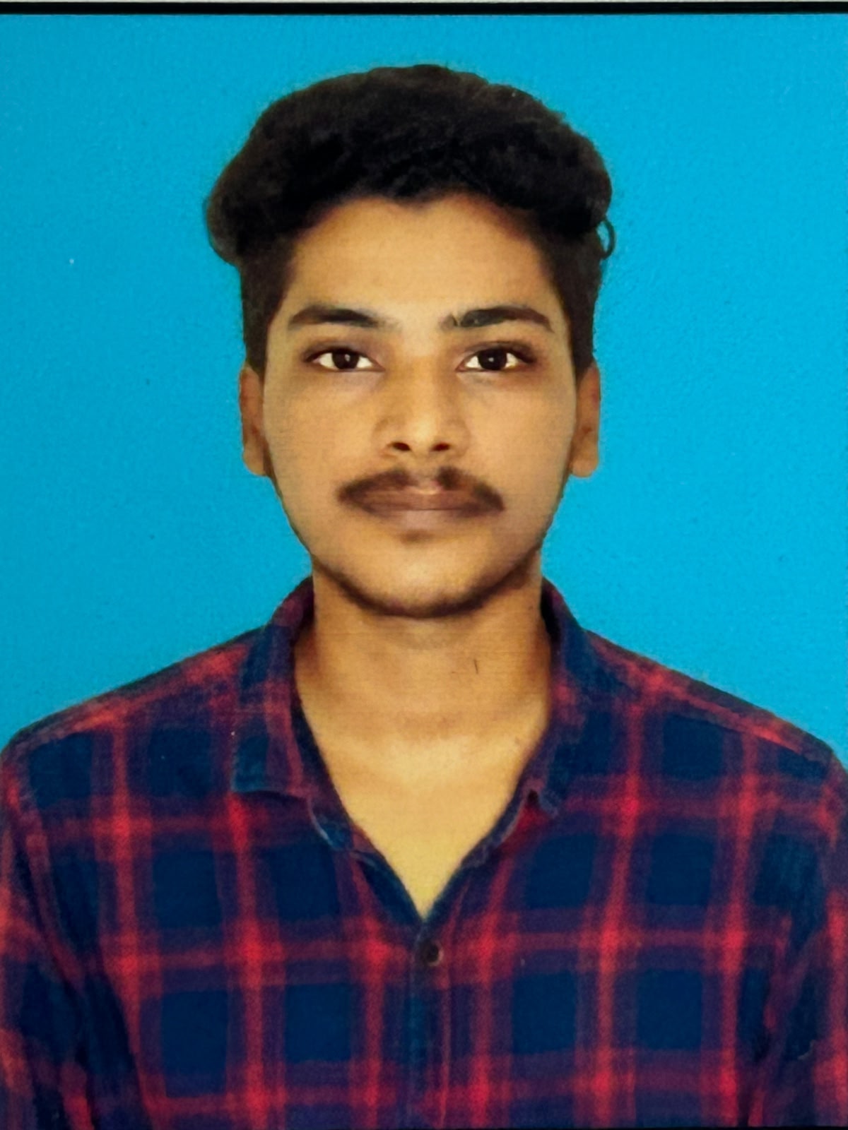 Murugesan K
