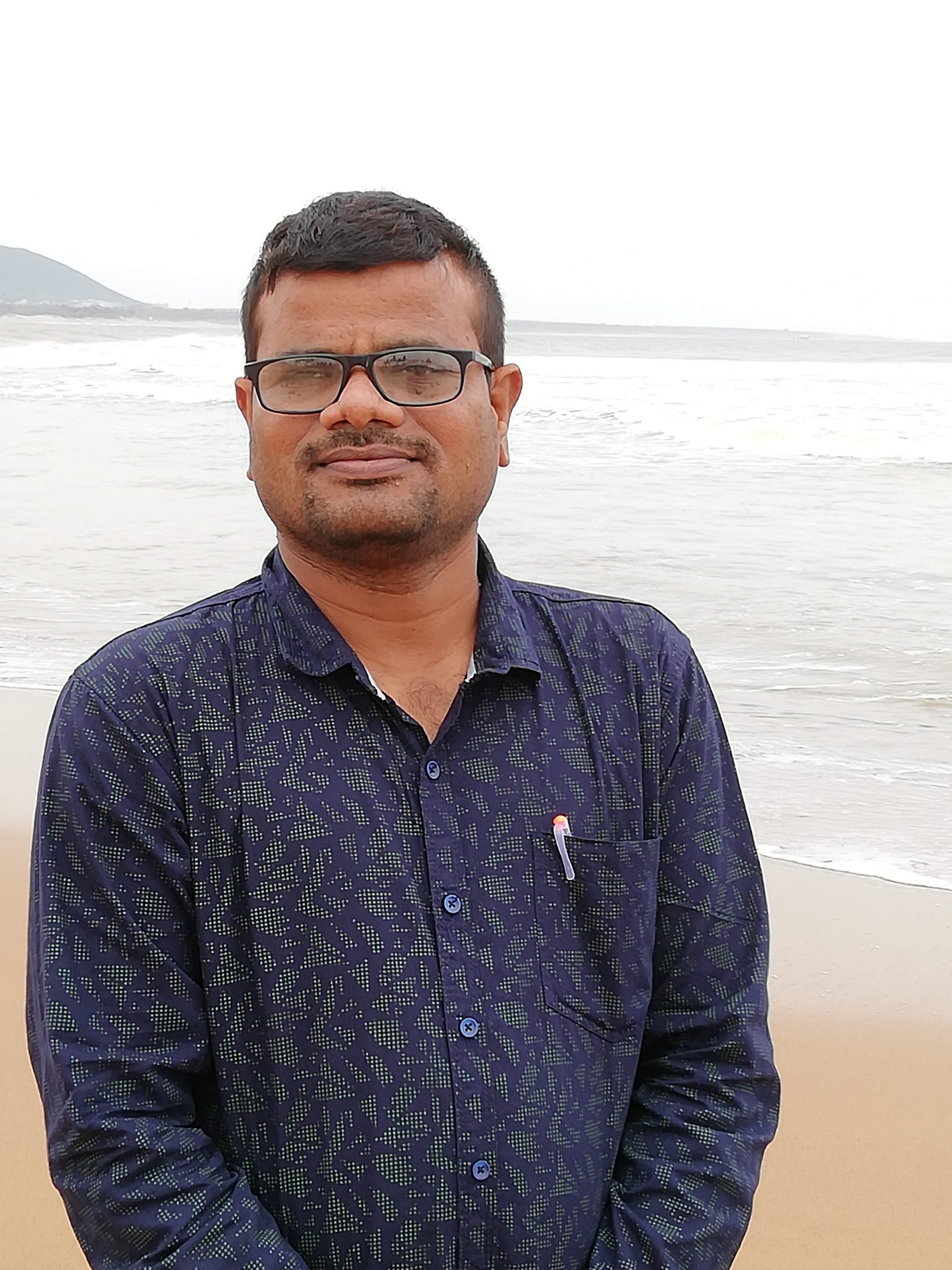 Dr.R.GURUNADHA